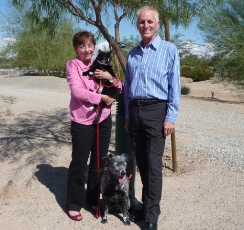 Cheryl and John with their two dogs