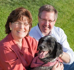 Nelsons pose wit their dog