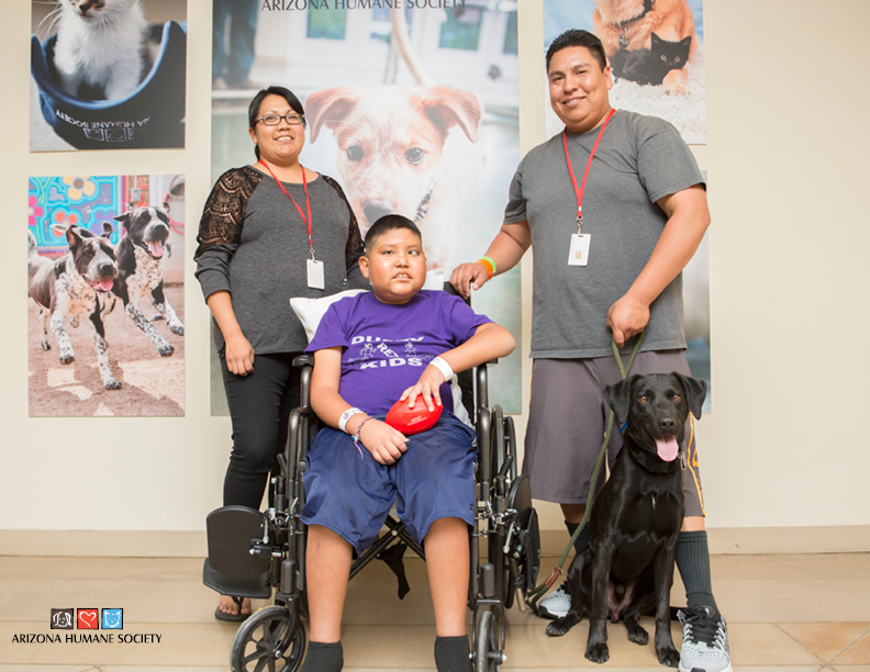 Darius, His Parents, and his new adopted dog Lucky